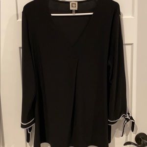 Black/white blouse with tie sleeves. Never worn!